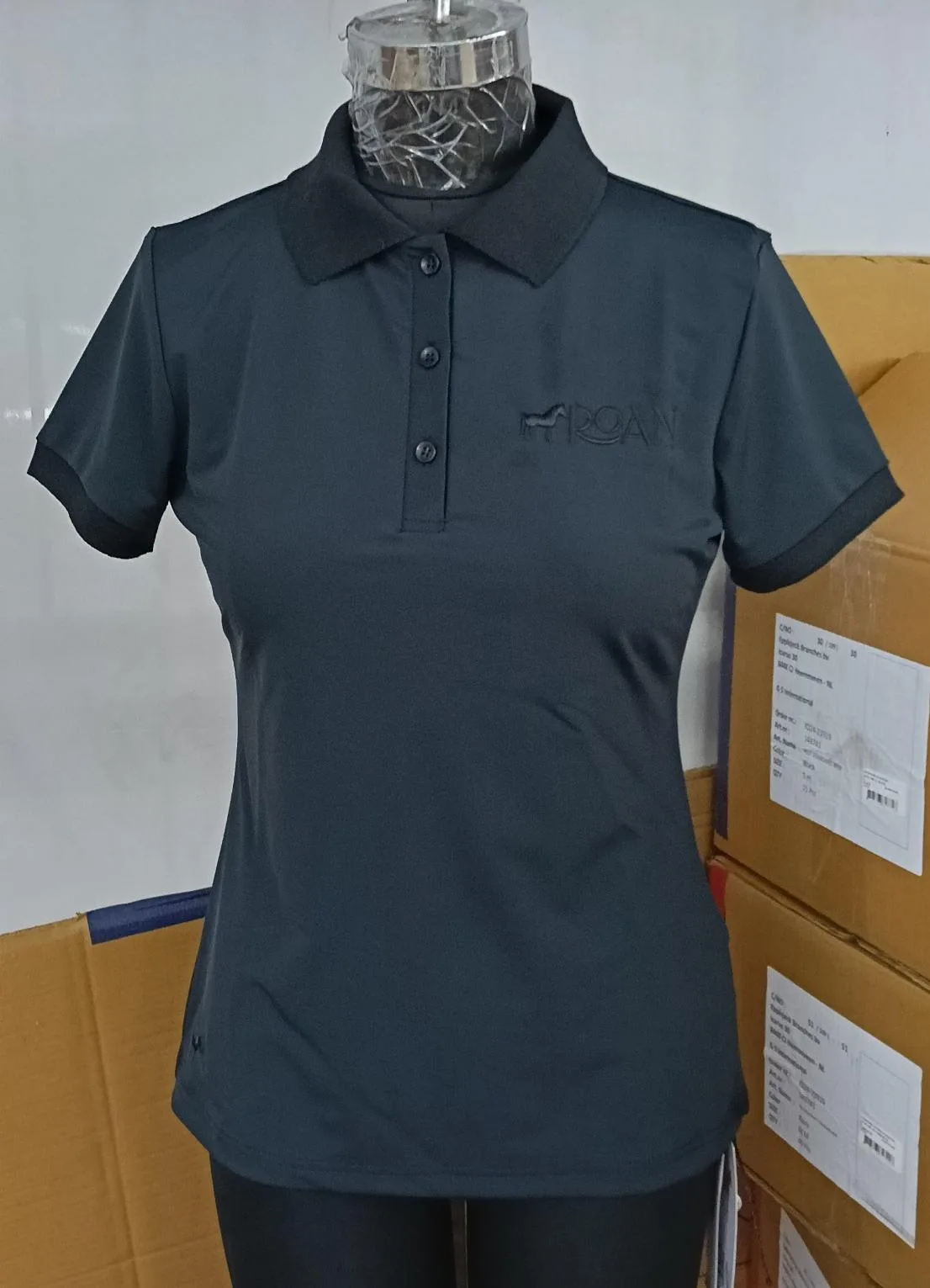 Black collar polo shirt — Equestrian goods sourced from India by Straight to Source