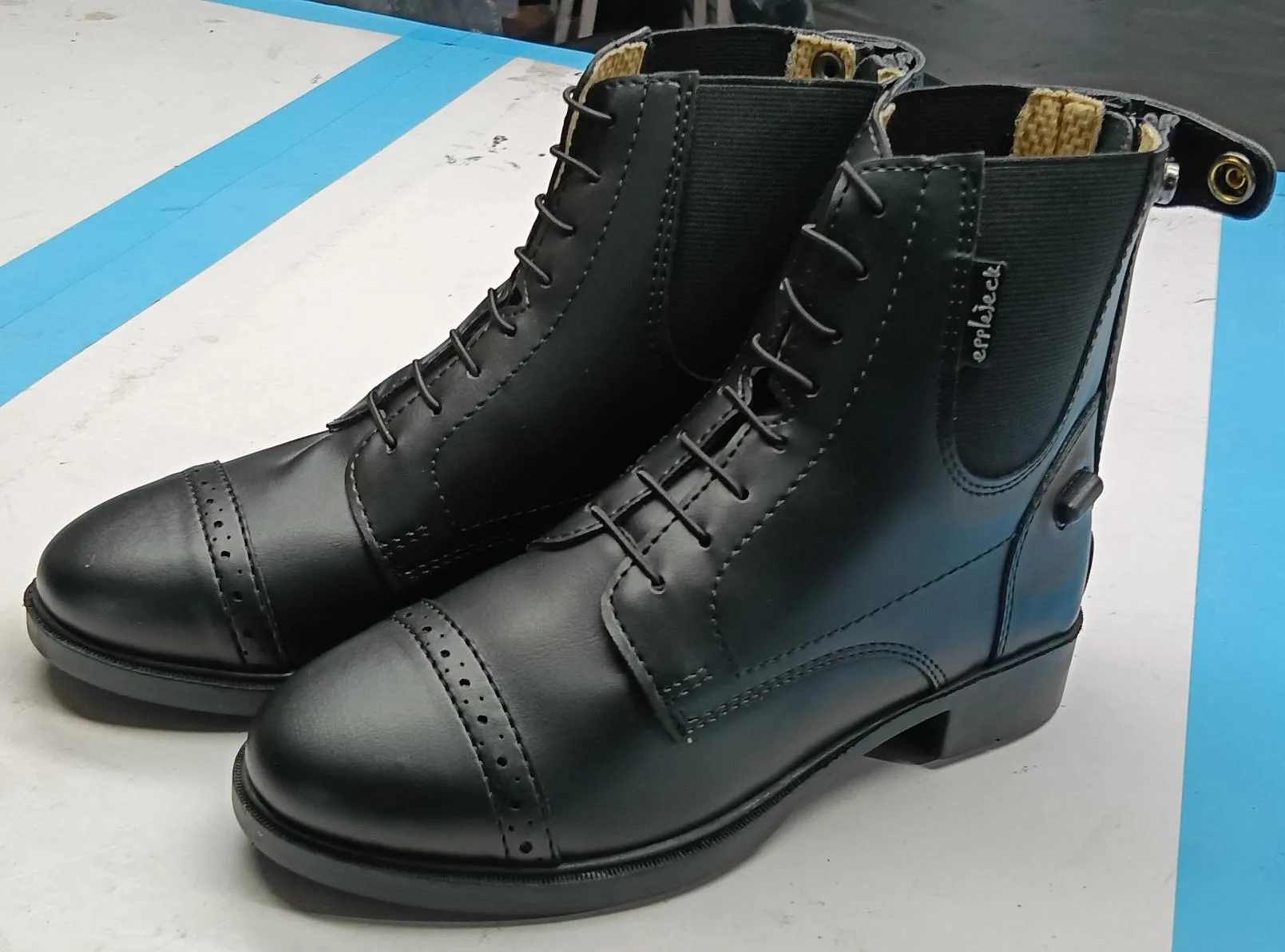 Black leather jodhpur padlock riding boots side view — Equestrian goods sourced from India by Straight to Source