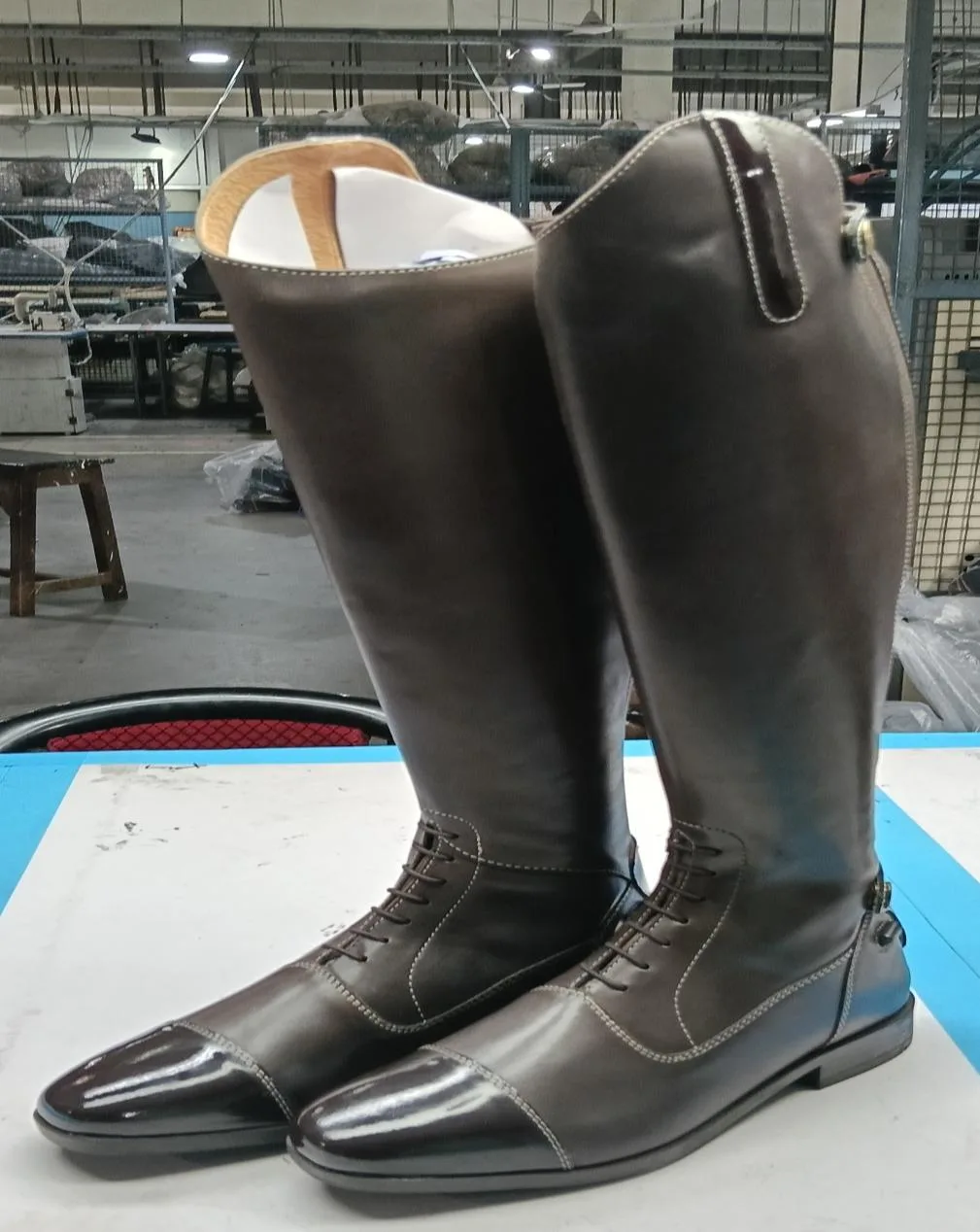 Brown leather riding boots factory shot — Equestrian goods sourced from India by Straight to Source