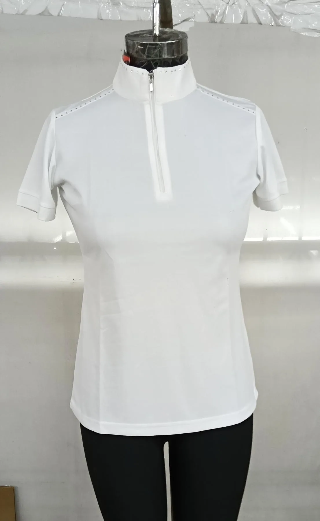 White sports polo shirt — Equestrian goods sourced from India by Straight to Source