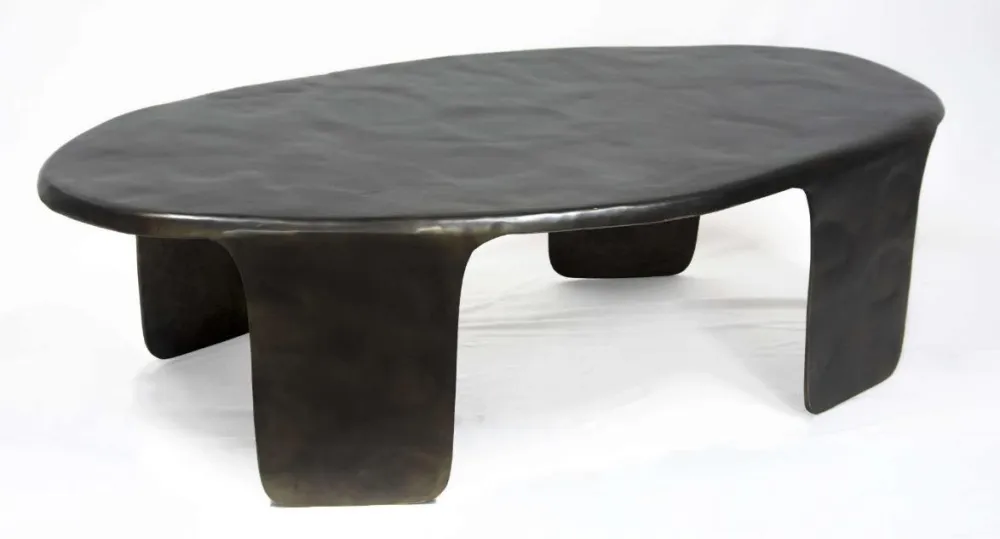 Natural material oval table — Metalware sourced from India by Straight to Source